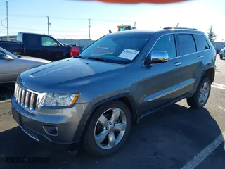 2013 Jeep Grand Cherokee Overland Summit with VIN 1C4RJFCT7DC585841, listed as a IAAI auction lot 41401170 with 122,719 mi miles. Bid and sale history available at carsss.com. Image 18.