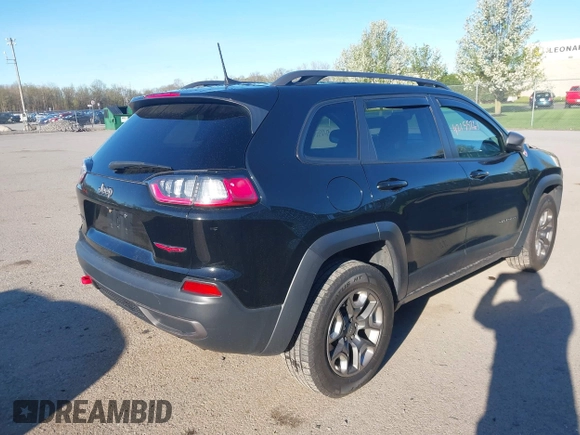 2019 Jeep Cherokee Trailhawk z VIN 1C4PJMBX0KD210316, wystawiony jako IAAI lot #42155261 z przebiegiem 100 889 mil mil oraz . Historia ofert i sprzedaży dostępna na DreamBid. Obrazek 4.