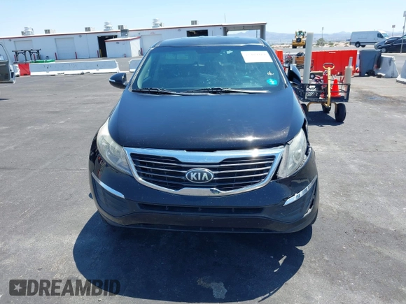 2013 Kia Sportage LX with VIN KNDPBCA25D7449584, listed as a IAAI auction lot 42489414 with 100,993 mi miles and . Bid and sale history available at DreamBid. Image 12.