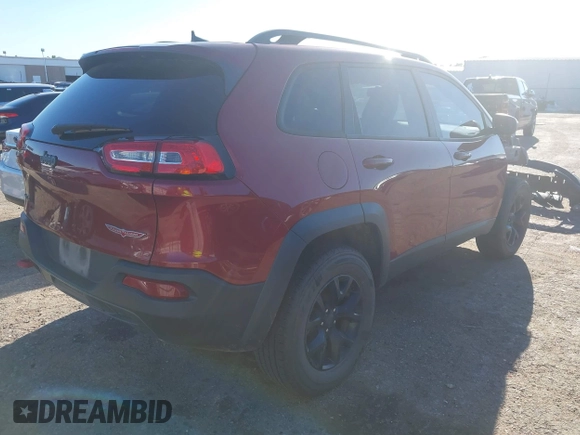 2017 Jeep Cherokee Trailhawk z VIN 1C4PJMBS9HW502323, wystawiony jako IAAI lot #42293817 z przebiegiem 153 127 mil mil oraz . Historia ofert i sprzedaży dostępna na DreamBid. Obrazek 4.