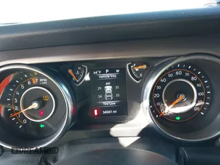2018 Jeep Wrangler Sport S with VIN 1C4GJXAG4JW283209, listed as a IAAI auction lot 41770557 with 34,041 mi miles and . Bid and sale history available at DreamBid. Image 7.