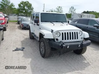 2015 Jeep Wrangler Unlimited Rubicon Hard Rock с VIN 1C4HJWFG7FL684057, выставлен на аукционе IAAI как лот 41963885 с пробегом 103 240 миль миль и . История ставок и продаж доступна на DreamBid. Изображение 6.