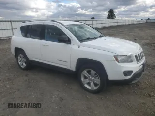 2014 Jeep Compass Sport with VIN 1C4NJDBB7ED503825, listed as a Copart auction lot 49867255 with 116,663 mi miles and Salvage Title. Bid and sale history available at carsss.com. Image 4.