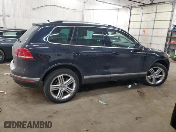 2015 Volkswagen Touareg Sport with VIN WVGEF9BP3FD003121, listed as a Copart auction lot 50572505 with 87,082 mi miles and Salvage title. Bid and sale history available at DreamBid. Image 3.
