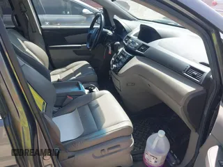 2012 Honda Odyssey EX-L with VIN 5FNRL5H69CB047425, listed as a IAAI auction lot 42064979 with 242,409 mi miles and . Bid and sale history available at carsss.com. Image 5.