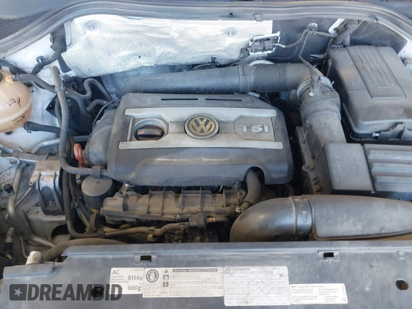 2013 Volkswagen Tiguan with VIN WVGCV3AX7DW605594, listed as a IAAI auction lot 42057457 with 131,629 mi miles and . Bid and sale history available at DreamBid. Image 10.