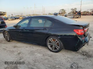2018 BMW 7 Series 750i with VIN WBA7F0C5XJGM22674, listed as a Copart auction lot 74833524 with 0 mi miles and Salvage Title. Bid and sale history available at carsss.com. Image 2.