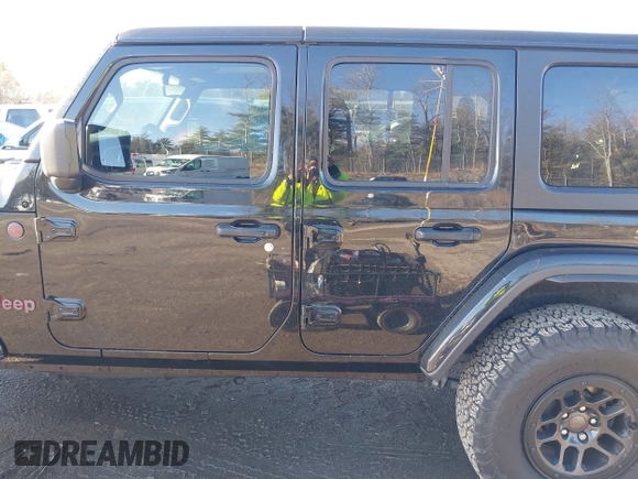 2023 Jeep Wrangler Rubicon with VIN 1C4JJXFGXPW682231, listed as a IAAI auction lot 41110264 with 15,147 mi miles and . Bid and sale history available at DreamBid. Image 14.