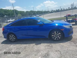 2018 Honda Civic EX with VIN 19XFC2F72JE036055, listed as a IAAI auction lot 41960037 with 128,650 mi miles and . Bid and sale history available at DreamBid. Image 13.