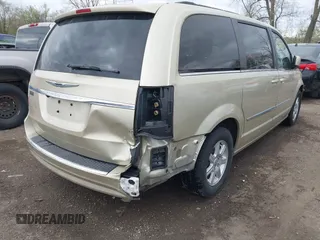 2011 Chrysler Town & Country Touring with VIN 2A4RR5DGXBR666934, listed as a IAAI auction lot 42022807 with 125,920 mi miles and . Bid and sale history available at DreamBid. Image 6.