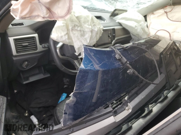 2023 Volkswagen Atlas SE z VIN 1V2HP2CA7PC515065, wystawiony jako Copart lot #57338515 z przebiegiem Nie podano mil oraz Szkoda całkowita • Salvage title. Historia ofert i sprzedaży dostępna na DreamBid. Obrazek 8.