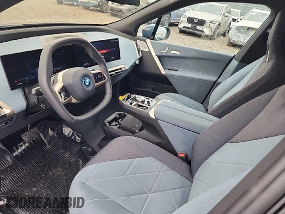 2024 BMW iX M60 z VIN WB533CF08RCR13397, wystawiony jako Copart lot #79058994 z przebiegiem 216 mil mil oraz Szkoda całkowita • Salvage title. Historia ofert i sprzedaży dostępna na DreamBid. Obrazek 7.