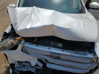 2019 Ford Escape Titanium z VIN 1FMCU9J93KUA51020, wystawiony jako Copart lot #60462495 z przebiegiem 59 998 mil mil oraz Szkoda całkowita • Salvage title. Historia ofert i sprzedaży dostępna na DreamBid. Obrazek 11.