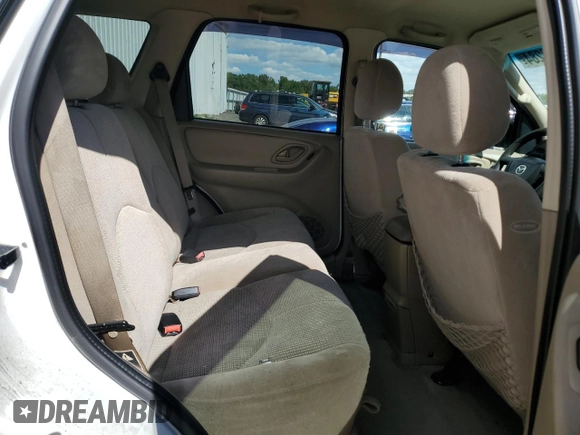 2003 Mazda Tribute LX with VIN 4F2CZ94133KM19916, listed as a Copart auction lot 73718284 with 151,644 mi miles and Salvage Title. Bid and sale history available at DreamBid. Image 11.