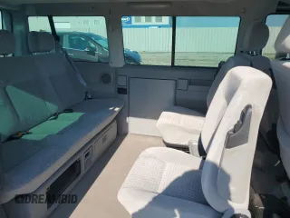 2000 Volkswagen EuroVan с VIN WV2MH4703YH013265, выставлен на аукционе Copart как лот 59003645 с пробегом Не указан миль и Списание • Salvage title. История ставок и продаж доступна на DreamBid. Изображение 11.