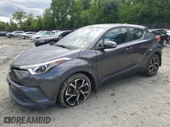 2018 Toyota C-HR XLE z VIN JTNKHMBX2J1003394, wystawiony jako Copart lot #58234865 z przebiegiem 132 574 mil mil oraz Szkoda całkowita • Salvage title. Historia ofert i sprzedaży dostępna na DreamBid. Obrazek 1.