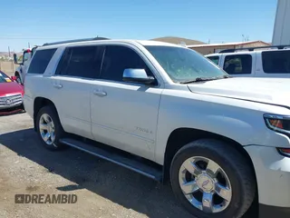 2016 Chevrolet Tahoe LTZ z VIN 1GNSKCKC8GR451685, wystawiony jako IAAI lot #42028917 z przebiegiem 73 398 mil mil oraz . Historia ofert i sprzedaży dostępna na DreamBid. Obrazek 13.