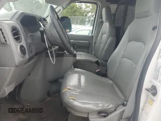 2010 Ford Econoline Cargo Commercial with VIN 1FTNE2EW5ADA87906, listed as a Copart auction lot 70585604 with 302,164 mi miles and Salvage title. Bid and sale history available at DreamBid. Image 7.