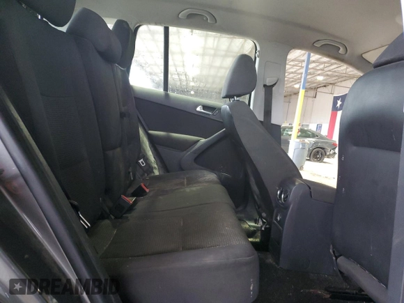 2014 Volkswagen Tiguan SE z VIN WVGAV3AX6EW542464, wystawiony jako Copart lot #84672184 z przebiegiem 144 064 mil mil oraz Czysty tytuł • Clean title. Historia ofert i sprzedaży dostępna na DreamBid. Obrazek 10.
