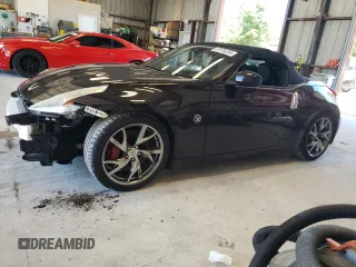 2013 Nissan 370Z Touring with VIN JN1AZ4FH7DM790607, listed as a Copart auction lot 57915234 with 11,487 mi miles and Salvage Title. Bid and sale history available at carsss.com. Image 1.