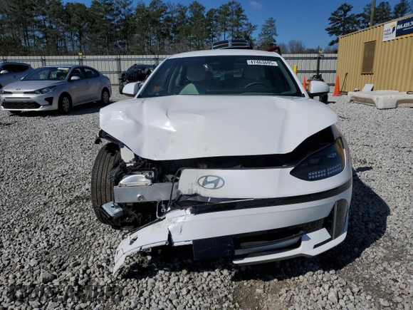 2023 Hyundai Ioniq 6 SEL z VIN KMHM34AAXPA024720, wystawiony jako Copart lot #47463695 z przebiegiem 21 845 mil mil oraz Szkoda całkowita • Salvage title. Historia ofert i sprzedaży dostępna na DreamBid. Obrazek 5.