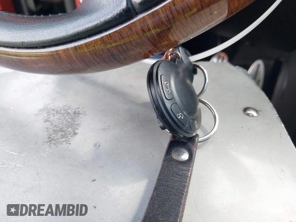 2007 MINI Hardtop S with VIN WMWMF73557TT80376, listed as a IAAI auction lot 42067228 with 174,262 mi miles and . Bid and sale history available at DreamBid. Image 11.