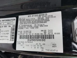 2016 Ford Fusion SE with VIN 3FA6P0HD7GR401848, listed as a IAAI auction lot 41687024 with 124,374 mi miles. Bid and sale history available at carsss.com. Image 9.
