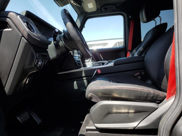 2021 Mercedes-Benz G 550 z VIN W1NYC6BJXMX382983, wystawiony jako Copart lot #61177185 z przebiegiem 22 835 mil mil oraz Szkoda całkowita • Salvage title. Historia ofert i sprzedaży dostępna na DreamBid. Obrazek 7.