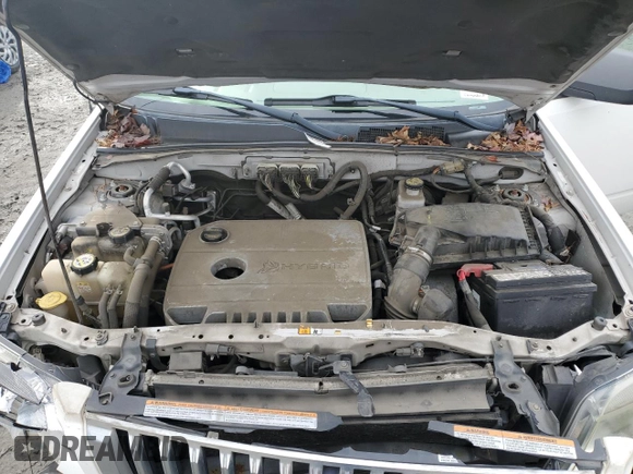 2009 Mercury Mariner Hybrid z VIN 4M2CU29309KJ04980, wystawiony jako Copart lot #85360014 z przebiegiem 166 860 mil mil oraz Szkoda całkowita • Salvage title. Historia ofert i sprzedaży dostępna na DreamBid. Obrazek 12.