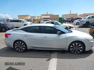 2016 Nissan Maxima SV with VIN 1N4AA6AP5GC395274, listed as a IAAI auction lot 41616698 with 102,736 mi miles and . Bid and sale history available at DreamBid. Image 13.