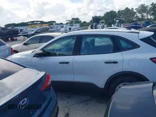 2021 Ford Escape S with VIN 1FMCU0F61MUA36822, listed as a IAAI auction lot 31372199 with 3,842 mi miles and . Bid and sale history available at DreamBid. Image 14.