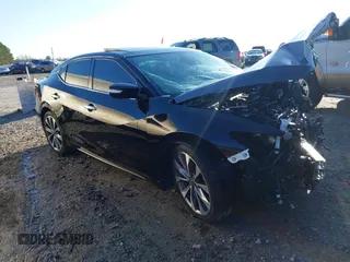 2023 Nissan Maxima Platinum z VIN 1N4AA6FV9PC513365, wystawiony jako IAAI lot #41652441 z przebiegiem 9 650 mil mil oraz . Historia ofert i sprzedaży dostępna na DreamBid. Obrazek 1.