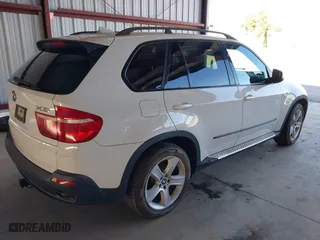 2007 BMW X5 3.0si with VIN 5UXFE43507L018015, listed as a IAAI auction lot 41880668 with 150,329 mi miles. Bid and sale history available at carsss.com. Image 4.