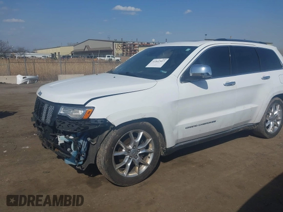 2015 Jeep Grand Cherokee Summit with VIN 1C4RJFJGXFC734025, listed as a IAAI auction lot 41842927 with 137,993 mi miles. Bid and sale history available at carsss.com. Image 17.