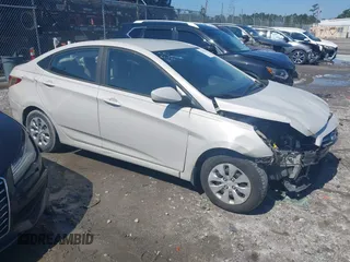2016 Hyundai Accent SE z VIN KMHCT4AE4GU078477, wystawiony jako IAAI lot #42269855 z przebiegiem 107 588 mil mil oraz . Historia ofert i sprzedaży dostępna na DreamBid. Obrazek 1.