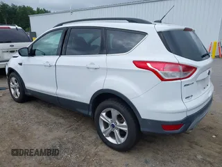 2014 Ford Escape SE with VIN 1FMCU9GX4EUE32062, listed as a IAAI auction lot 42710911 with 68,201 mi miles and . Bid and sale history available at DreamBid. Image 3.