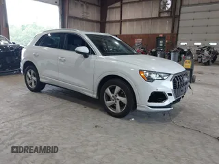 2020 Audi Q3 Premium with VIN WA1AECF3XL1090825, listed as a IAAI auction lot 42541577 with 32,432 mi miles and . Bid and sale history available at DreamBid. Image 1.