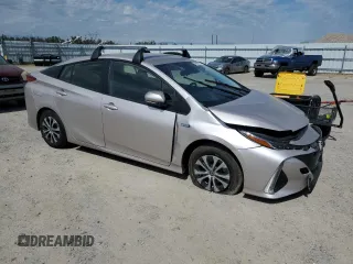 2021 Toyota Prius LE with VIN JTDKAMFP5M3165564, listed as a Copart auction lot 49930215 with 24,742 mi miles and Salvage Title. Bid and sale history available at DreamBid. Image 4.