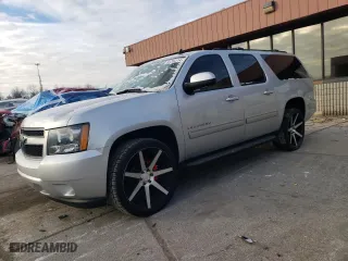 2013 Chevrolet Suburban LT with VIN 1GNSKJE77DR245000, listed as a Copart auction lot 83204114 with 135,132 mi miles and Salvage Title. Bid and sale history available at carsss.com. Image 1.