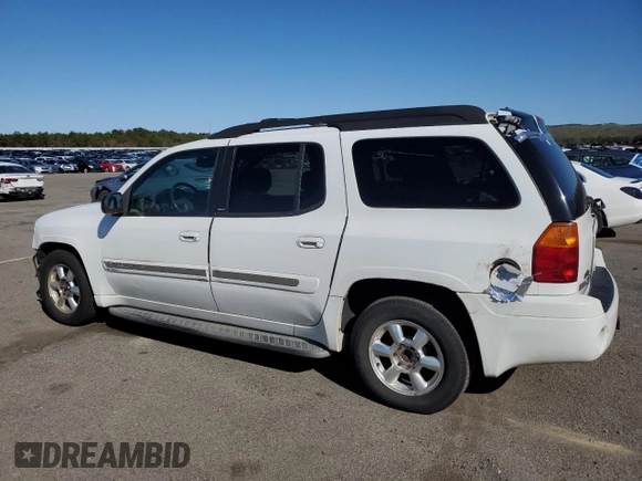2003 GMC Envoy SLT z VIN 1GKET16S736179347, wystawiony jako Copart lot #52370775 z przebiegiem 230 623 mil mil oraz Szkoda całkowita • Salvage title. Historia ofert i sprzedaży dostępna na DreamBid. Obrazek 2.