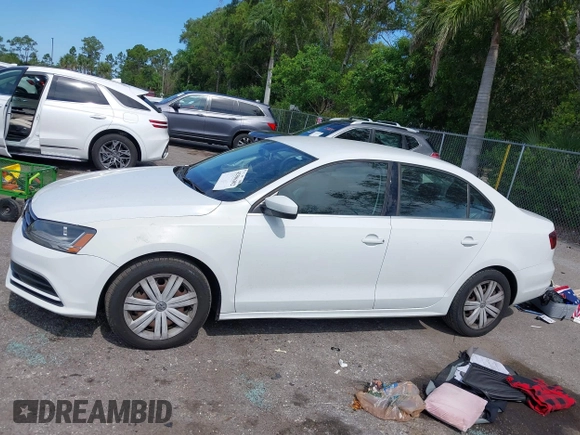 2017 Volkswagen Jetta S with VIN 3VW2B7AJXHM374687, listed as a IAAI auction lot 42596302 with 63,728 mi miles and . Bid and sale history available at DreamBid. Image 14.