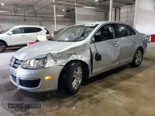 2009 Volkswagen Jetta z VIN 3VWAL71KX9M072304, wystawiony jako Copart lot #57027785 z przebiegiem 191 554 mil mil oraz Szkoda całkowita • Salvage title. Historia ofert i sprzedaży dostępna na DreamBid. Obrazek 1.