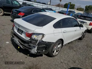 2015 BMW 4 Series 428i xDrive with VIN WBA4C9C58FG135227, listed as a Copart auction lot 44178973 with 91,571 mi miles and . Bid and sale history available at DreamBid. Image 3.