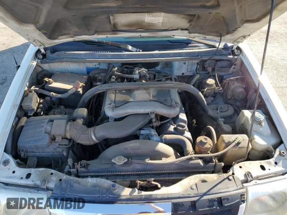 2002 Suzuki XL7 Standard z VIN JS3TX92VX24118298, wystawiony jako Copart lot #42781415 z przebiegiem 312 010 mil mil oraz Szkoda całkowita • Salvage title. Historia ofert i sprzedaży dostępna na DreamBid. Obrazek 13.