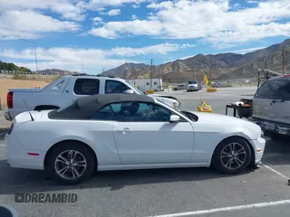 2014 Ford Mustang V6 with VIN 1ZVBP8EM4E5243008, listed as a IAAI auction lot 41572234 with 114,392 mi miles. Bid and sale history available at carsss.com. Image 13.