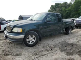 2003 Ford F-150 XL with VIN 1FTRX07WX3KB99581, listed as a Copart auction lot 56907765 with 232,597 mi miles and Salvage title. Bid and sale history available at DreamBid. Image 1.