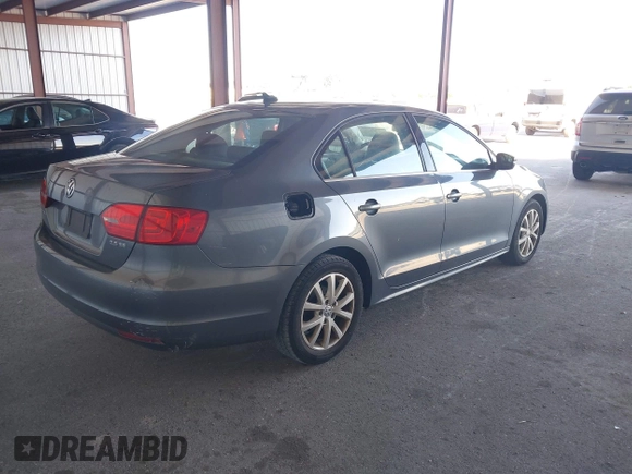 2013 Volkswagen Jetta SE z VIN 3VWDX7AJ3DM254962, wystawiony jako IAAI lot #41753707 z przebiegiem 125 225 mil mil oraz . Historia ofert i sprzedaży dostępna na DreamBid. Obrazek 4.