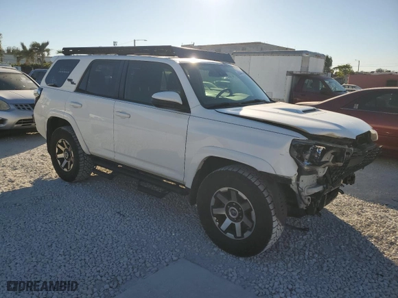 2021 Toyota 4Runner TRD Off Road with VIN JTEPU5JR6M5864259, listed as a Copart auction lot 83344384 with 106,045 mi miles and Salvage Title. Bid and sale history available at carsss.com. Image 4.