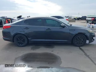 2011 Kia Optima LX with VIN KNAGM4A72B5057583, listed as a IAAI auction lot 41649320 with 207,898 mi miles and . Bid and sale history available at DreamBid. Image 13.