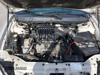 2003 Ford Taurus LX Standard z VIN 1FAFP52U93A159333, wystawiony jako Copart lot #78080944 z przebiegiem 54 652 mil mil oraz Szkoda całkowita • Salvage title. Historia ofert i sprzedaży dostępna na DreamBid. Obrazek 11.
